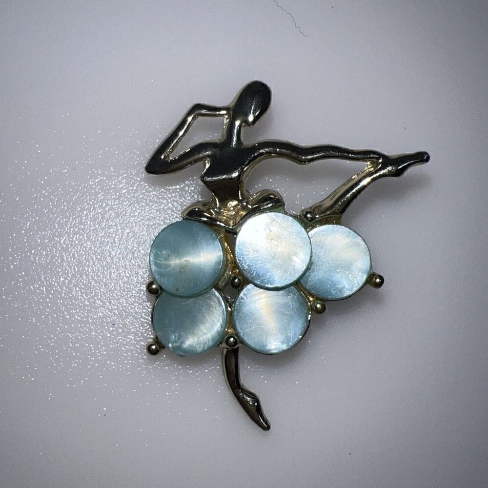 1950s mid century abstract ballerina pin pearlized green lucite on metal